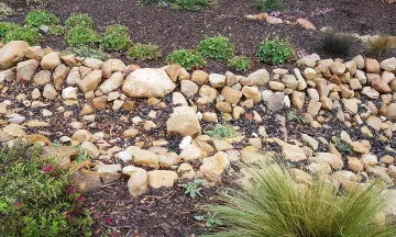 Infiltration trench on a local property, example of a BMP that meets SWMP requirements