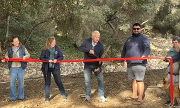 City of Santa Barbara Mayor Randy Rowse and others cut a red ribbon at Mission Creek in Oak Park