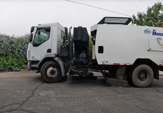 street sweeper vehicle on a residential road