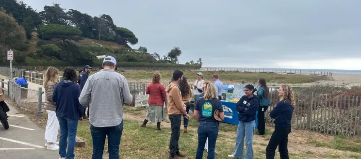 People gathering Creek Week at Andree Clark Bird Refuge