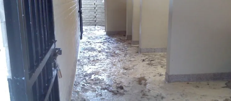 Water and seafoam inside Leadbetter Beach restrooms during March 2014 wave event