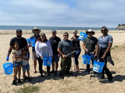 Volunteers clean up Leadbetter Beach. 