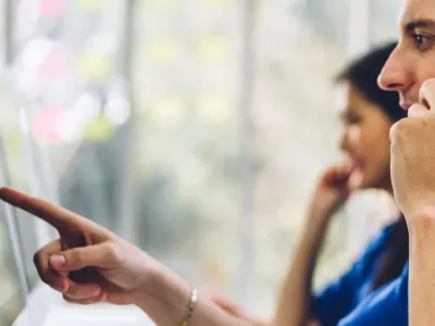Call center workers, assisting customers over the phone